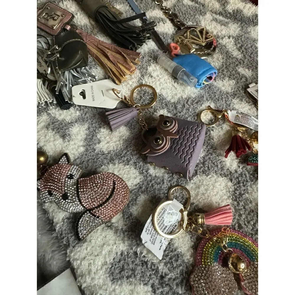 Lot of designer keychains,bag charms bling disney tassell